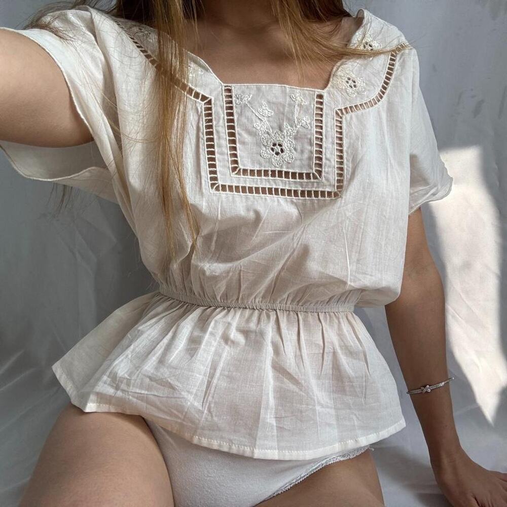 White blouse with lace details